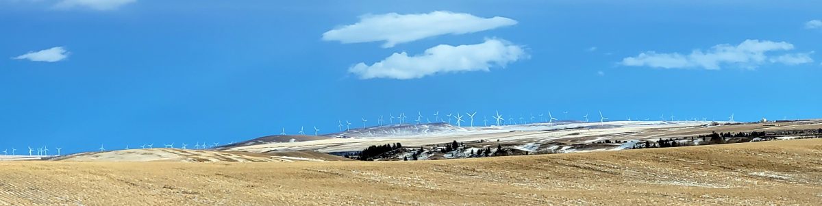 Wind turbines ona prairie ridge